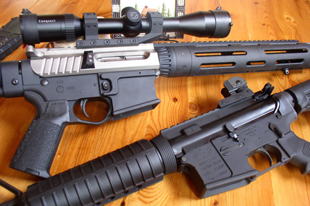 Completed, the pair of ARs sits happily on mother-in-law’s kitchen table. Note the eye catching contrast of the FailZero treated receiver with the rest of the black rifle. The author is all about good looks.