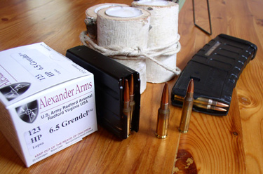 6.5 Grendel vs. .223 Remington. As can be seen the Grendel uses a significantly fatter cartridge, with a much longer bullet. Grendel mags are black stainless steel, while the .223 on the right stands before the vaunted Pmag.