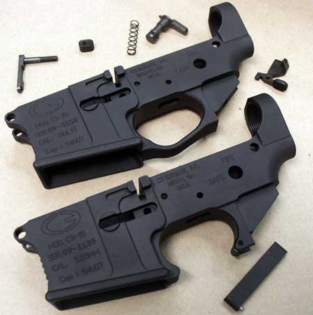 The C3 Defense lowers, surrounded by some of the small parts that go into them. Note the enhanced model on top with the integral trigger guard. These are excellent, excellent receivers.