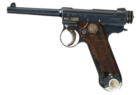 After World War II, there was an awakening to the quality of Japanese arms when returning soldiers brought thousands of them home as souvenirs. Today, they are highly collectible. This Type-14 Nambu was manufactured at the Nagoya Army Arsenal in February 1927. Rock Island Auction valued it between $950 and $1,100 (Lot 169) and said that “while the magazine is nickel and mismatched, the gun is in excellent condition. It retains approximately 90 percent original blue finish and 75 percent straw colors. The grips are very good with small chip out of left grip on bottom, the usual gouge from the safety lever and minor handling marks….the right side grip screw is locked up and the head is slightly marred.”