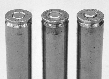 Pistol primers should not be used in rifle cases since they will seat too deeply as in the case on the left. Center case shows proper seating depth while high primer on the right will give poor ignition and possible slam-fire in an autoloader.