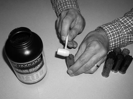 If your reloading press breaks, you can build loads by hand … with the right measuring devices, that is. A 1-1/8-ounce load of #8s will be about 460 pellets. You can count those. You can also use hand dippers to check the throw of your loads.
