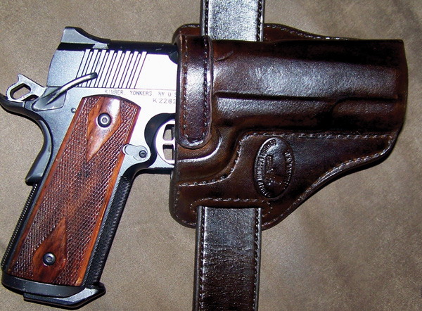 Kimber-10 The Haugen Handgun Leather crossdraw holster offers excellent fit and finish and good design, all we may ask.