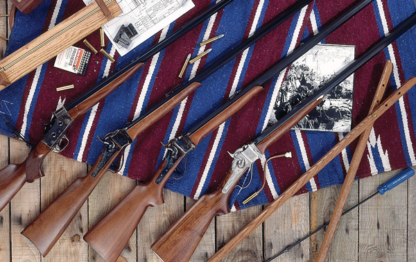 SharpsLead Dixie Gun Work’s line-up of Model 1874 Sharps rifles, by Pedersoli, include (from right) an engraved Silhouette Rifle, a standard version of that rifle, and the Lightweight Target-Hunter rifle. The rifle at far left is a Pedersoli “John Bodine” Remington rolling block rifle.