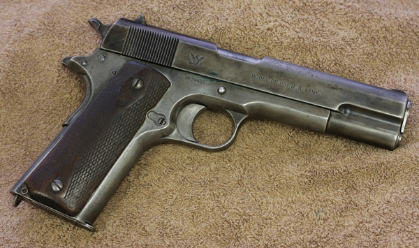 1911GreatWar-2 Springfield, as a government arsenal, had its own markings. Here you see the American Eagle on the slide of a Springfield 1911.