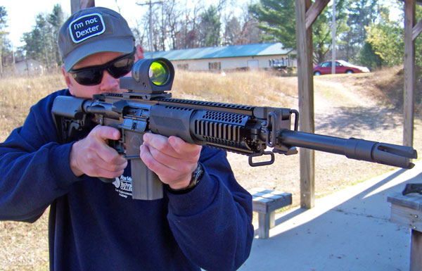 LAR308-3 The first thing you notice about the Rock River Arms LAR-8 Elite Operator is that you have a stout yet maneuverable rifle in your hands. True it is heavier than a .223 version, but it is well balanced and easy to handle.