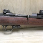 The stock and rail are installed and the wood is showing off its grain a bit. (Below) An image from the rear quarter shows the whole assembly, rail, stock, and dot