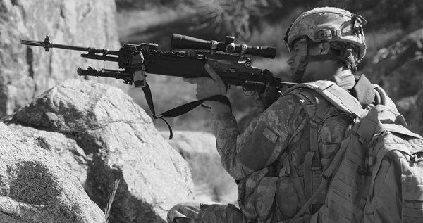 SemiautoSniper-3lead In the mountains, where you might need range, a .308 rifle can be quite useful, Here Spc Rockwell scans the ridgeline. DoD photo by Spc. Eric Cabral, U.S. Army.