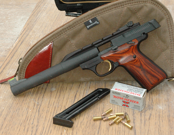 BuckMark-Lead590 The Browning Buck Mark Hunter, with its bull barrel and integral scope mount is ready for action in the woods. This pistol would do just fine for bringing down squirrels or the odd cottontail that happens to stand still long enough to present an ethical shot.