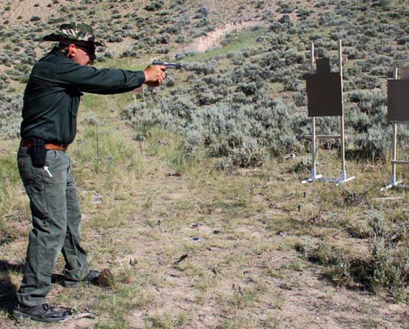 El-Presidente-006-590 Here is full draw. Start closer to the targets, this is 5 yards. Practice slow fluid moves at first and strive for center hits. Speed will come with practice. As you get faster at this distance move back a few yards.