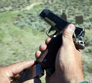 El-Presidente-012 Turn the pistol slightly to the side and insert the mag keeping it all pointed downrange to the threat.
