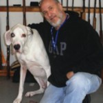Jan and Rascal, best friends, take a break in his shop.