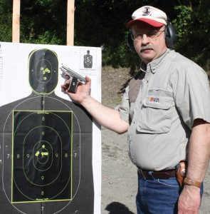 Workman at the range with a Colt Mustang Pocketlite in .380 ACP. That target was set at 15 yards from the firing line.