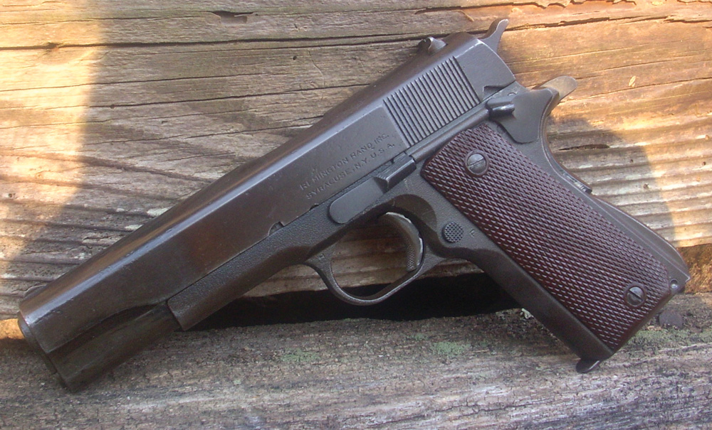 A well-worn, pitted Remington Rand M1911A1 from WWII that will still shoot 2½-inch groups at 25 yards all day long. There is play in the slide to allow plenty of room for dirt and sand, but it does not hurt its accuracy one bit. It has never jammed under any conditions. This is a gun to stake your life on.