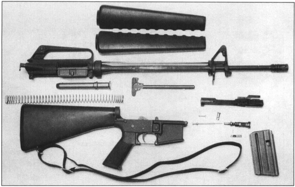 8-ar The M16A1 field-stripped. The ease and simplicity of disassembly made cleaning easy. All AR-15/M16-series weapons disassemble in the same manner.