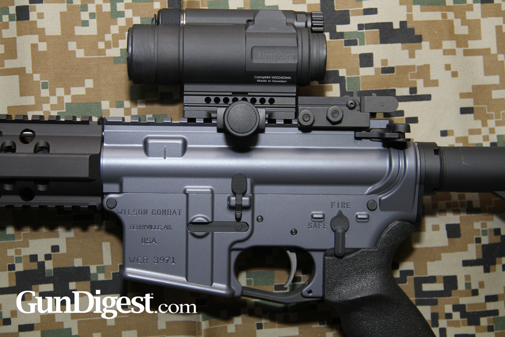 AR15Review-Wilson6.8-Lead One of the Wilson 6.8 rifles, here with an Aimpoint M4 on it. You’ll note that the Wilson BUIS doesn’t crowd the Aimpoint, and when it flips up the Wilson BUIS won’t bang the M4.