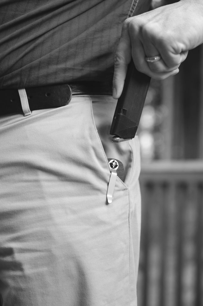 The SnagMag yields a spare Glock magazine from a trouser pocket. At rest, it looks like a pocketknife.