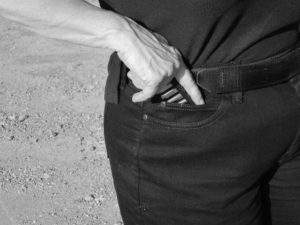 This lady carries Speed Strip in a watch pocket to back up her Smith & Wesson Airweight .38 Special.