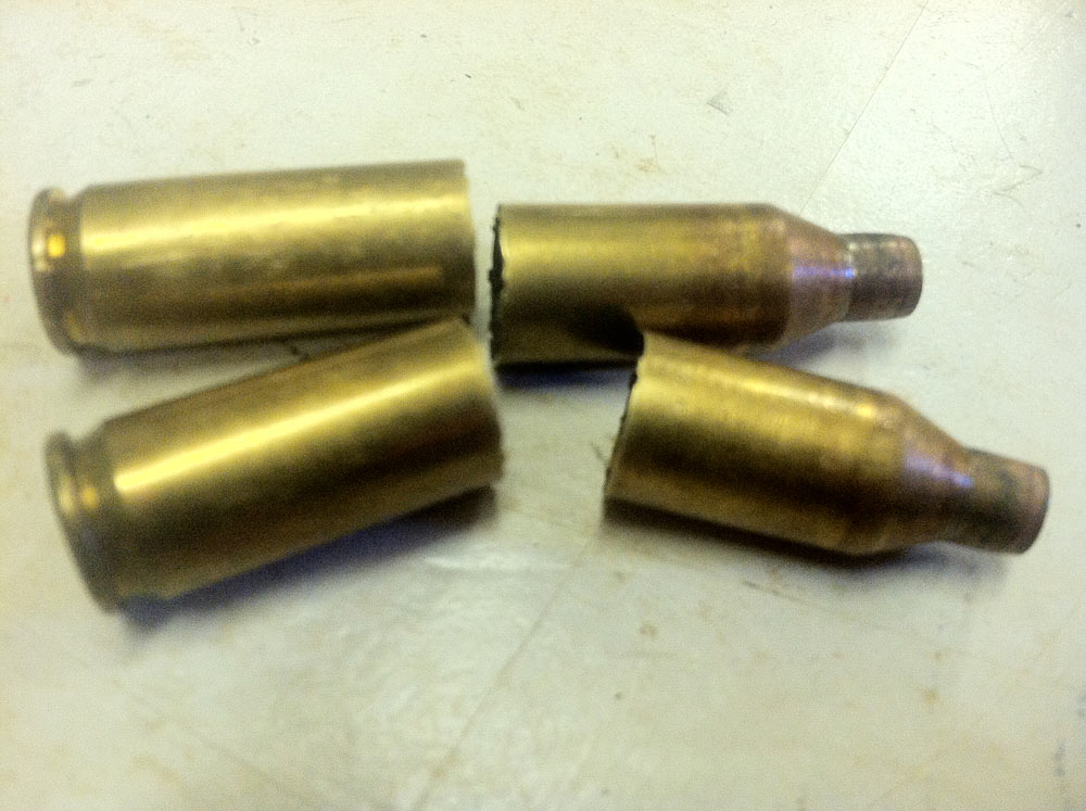 The neck of the case isn't the only area that needs to be inspected for damage. Cases can break in two after repeated firings, due to the brass flowing forward.