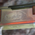 The 725’s steel receiver has a silver nitride finish and high-relief engraving. A duck adorns the right side of the field model, and a pheasant appears on the left. The receiver is narrower than older models, thanks to a smaller diameter full-length hinge pin.