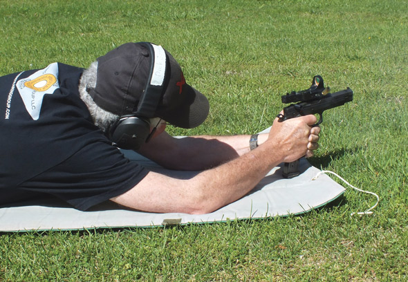 TIn prone, the 27 round magazine makes it easier for me to get my eyes on the red dot. Recoil is mild and the gun settles back down for the next shot almost instantly.