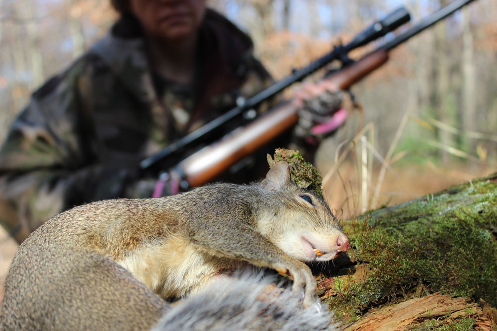 This is what it’s all about—a rimfire rifle and telescope combination capable of drilling long-distance shots on small game using real-world field shooting positions.