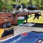 The author’s latest F-TR rifle on its first outing for load development. Notice the one-piece cleaning rod and the bore guide. The syringe near the ammo box is used to apply a special grease at various points on the bolt.