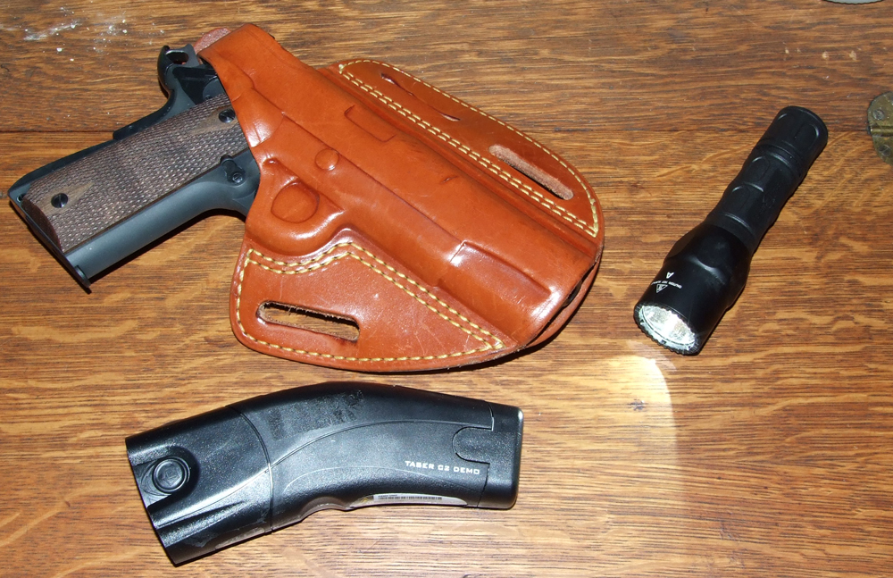 GSG1911-4 The author argues that while the .22LR is not the recommended defensive caliber, it sure beats a "clenched fist" and angry words.