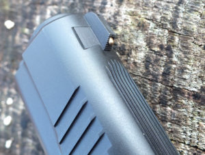 There’s a bright brass bead centered in the modified Patridge front sight. That's a blast from the past.