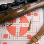 The top cluster was a 100-yard benchrest group, and the bottom group was shot off-hand using the leather sling and kneeling position. While the top group indicates this load is not very accurate, note that the off-hand group, other than point of impact being lower, was only slightly larger. The rifle is a custom-made .280 Ackley Improved.