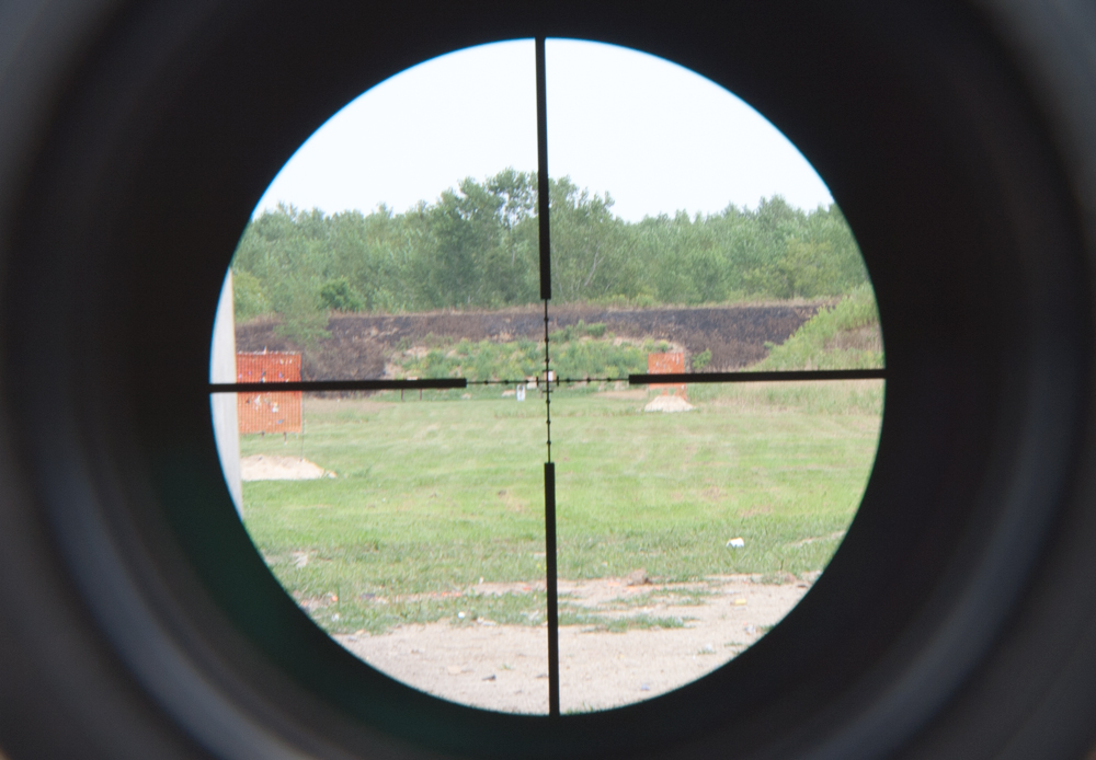 LeatherwoodARTM1000-Part3-1 Here's what the Leatherwood ART M1000 scope reticle looks like with the center ranging bracket on an 18-inch high target. By zooming in to fit the paper in the bracket, the scope automatically adjusts for the range, which happened to be 400 meters.