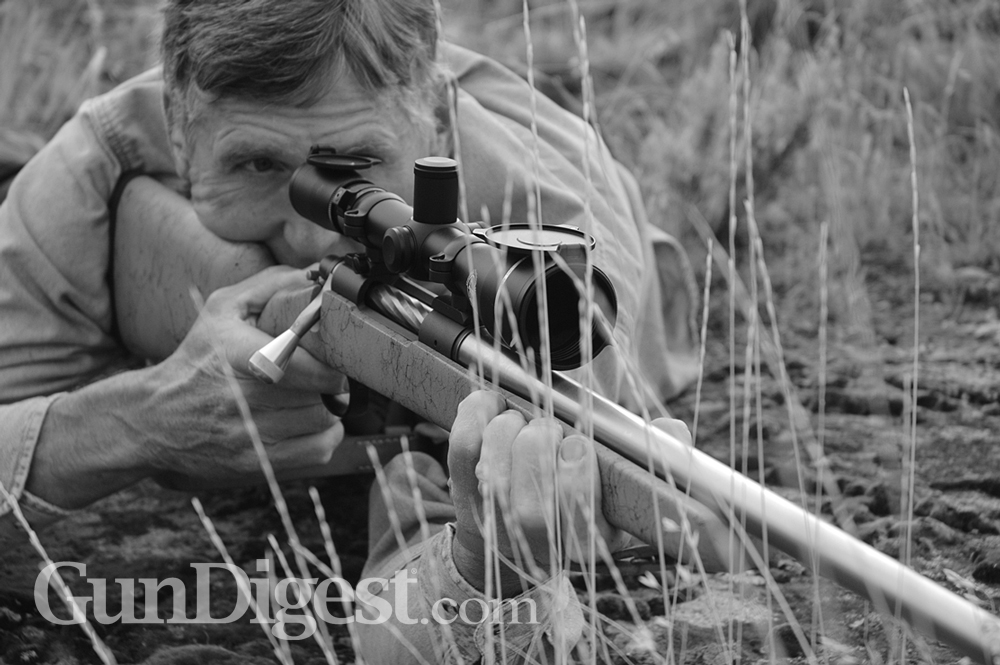 Long_Range_Shooting_LeadB Prone in prairie grass, Wayne steadies a heavy-barreled .33 wildcat on a Remington action. The 4.5-14X Leupold is standard GreyBull fare. It has given him saucer-sized groups at 780 yards.
