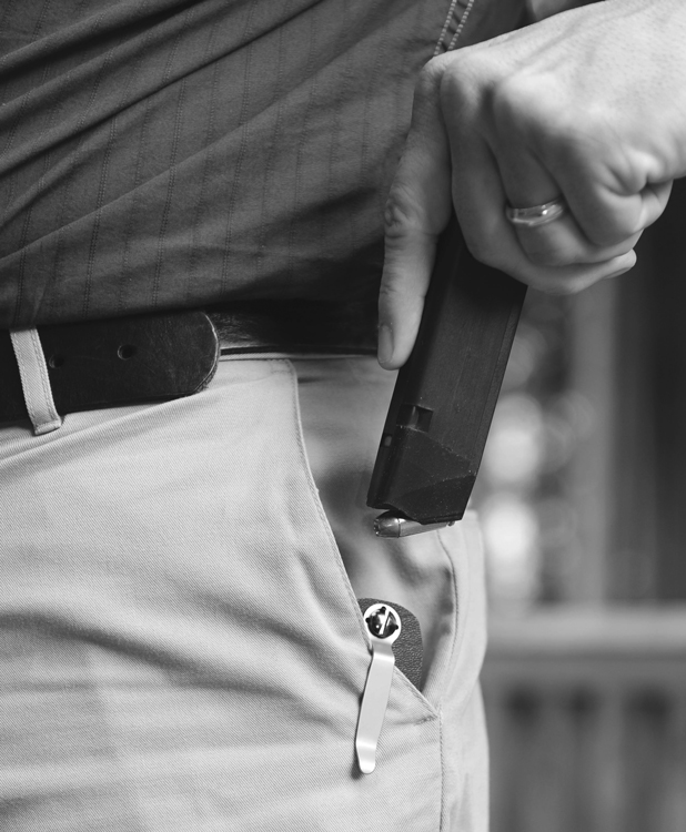 The Snagmag, developed by a career plainclothes lawman, yields a spare Glock magazine from a trouser pocket.