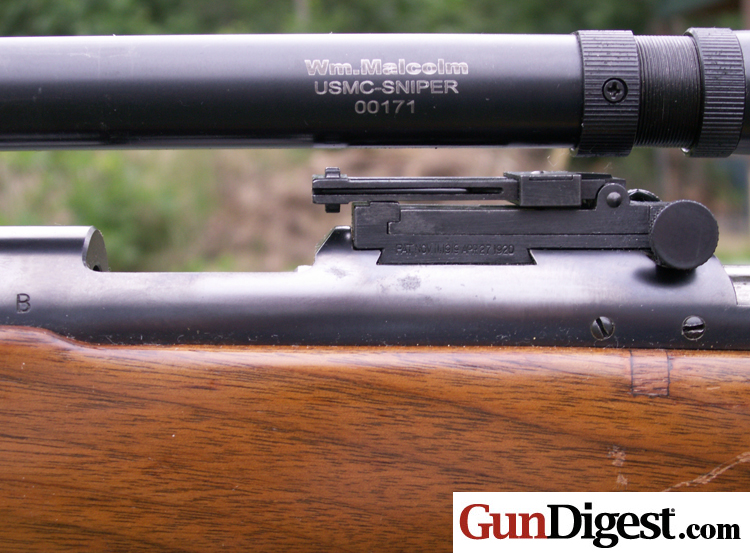 Mounted Leatherwood 8X Wm. Malcolm USMC Sniper Scope The Leatherwood Malcolm 8X sniper scope mounted onto a Winchester Model 52B.