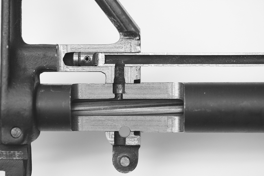 OFPD-0004 The origins of the gas flow. The gas gets vented out of the barrel, through the front sight housing, and down the tube towards the carrier key.