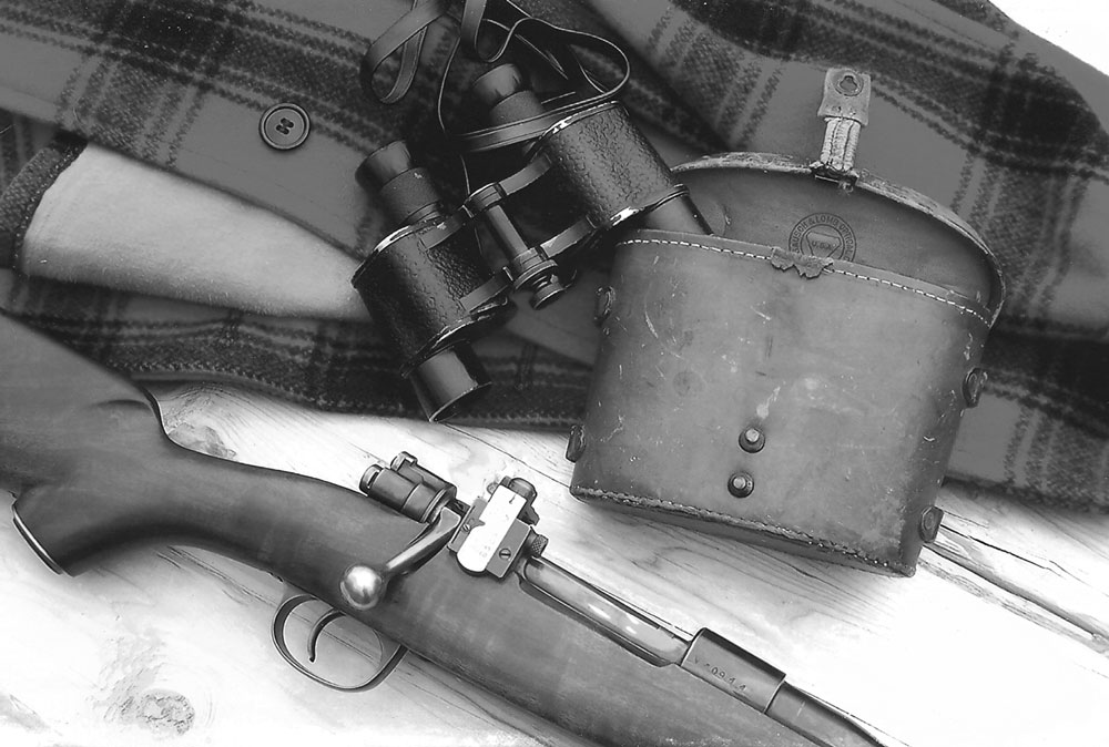 OGGMauser-Lead590 These Bausch & Lomb 6-power (6 X 30mm) binoculars are World War II-vintage, and were issued for use by the U.S. Navy. Later, when sold as war surplus, thousands were purchased for use by hunters. The author purchased these binoculars recently at the Log Cabin Gun Shop in Lodi, Ohio, after completing the work on his 7mm/08 Mauser. They were used on the Wyoming antelope hunt.