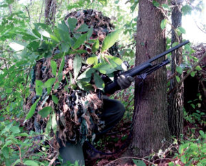 Rifle-Painting-4 You can be wearing great camouflage and blend into your environment, but a black weapon attracts attention like a clown at a funeral. Notice how the solid green pants stand out; stick to the idea that camouflage does its best to replicate nature’s random patterns.