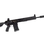 AR-15 outfitted with a SilencerCo Specwar suppressor on its muzzle.