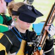 Amy Fister checks the chamber of her gun in between shots at the NRA 3-Position Championship at Camp Perry, Ohio.