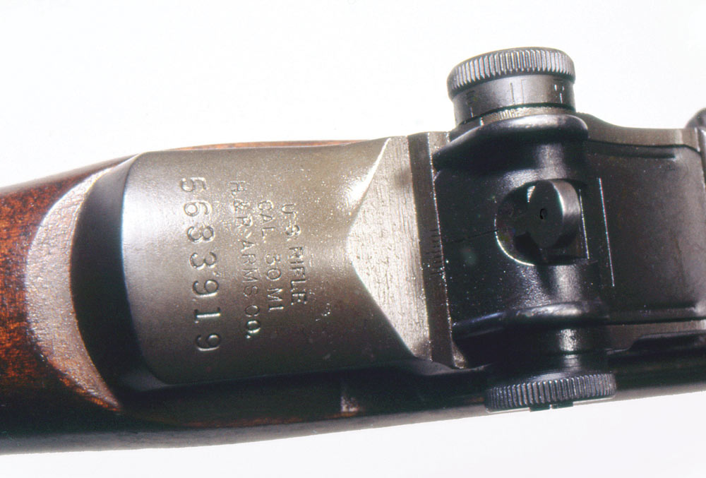 A 5.6 million Harrington and Richardson rifle, import marked, acquired in almost unused condition, all collector correct except for the operating rod, photographed here while the stock was being degreased.