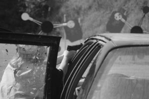 Florida/Georgia Regional woman champ Gail Pepin exits driver's seat, uses engine block as cover to engage far right targets with her Springfield XD(m) 9mm.