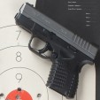 The good trigger and sights allow real accuracy with these guns. I made no adjustment to get this well centered up group. Ten shots Ten yards Standing, Two magazines.