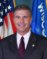 vanhollen-old Wisconsin Attorney General J.B. Van Hollen and the Wisconsin Dept. of Justice wrote "Emergency Rules" creating CCW training requirement stricter than what the legislature intended.